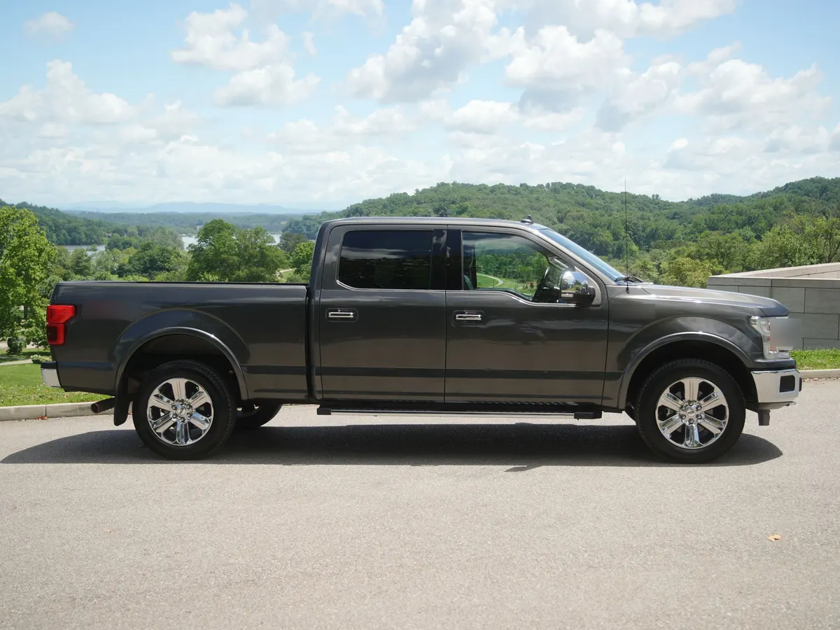 A pickup truck parked outside, ready for service